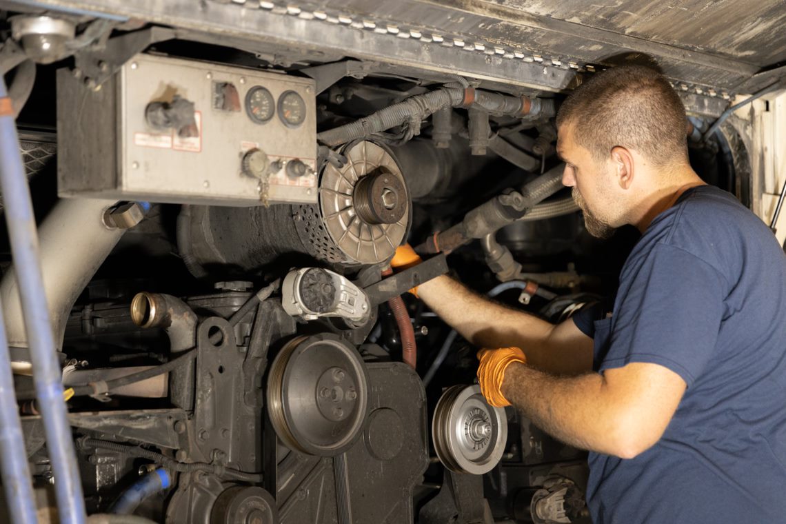 Technician doing maintenance on a PSTA bus
